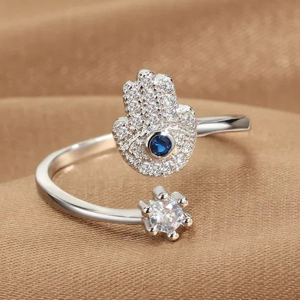 Protective ring for women with Arabic Hand of Fatima in silver blue