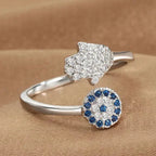 Protective ring for women with Arabic Hand of Fatima in silver blue