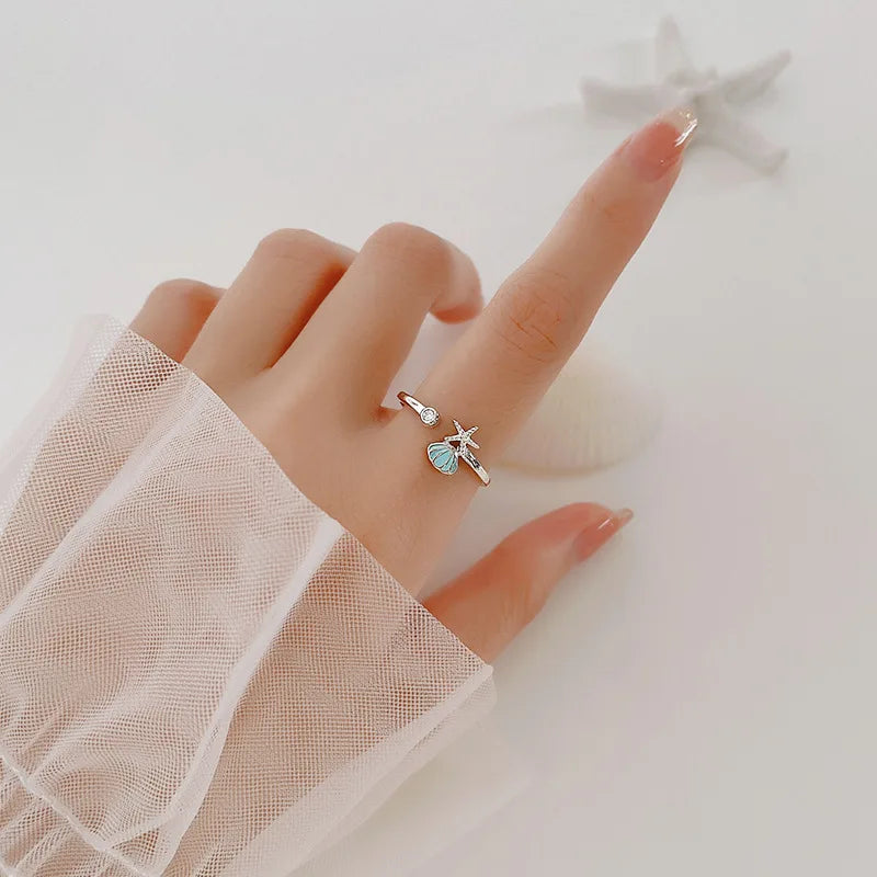 Bague Coquillages Etoile de Mer et Coquille Saint-Jacques et Zircon argent