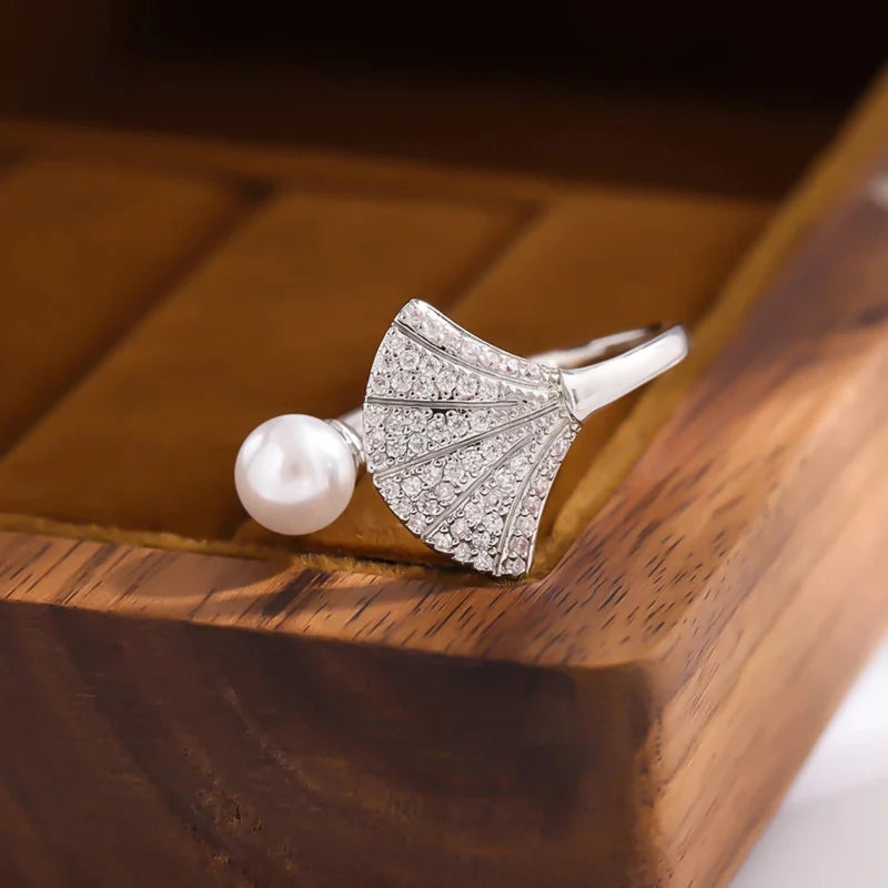 Кольцо с раковиной морского гребешка и жемчужиной