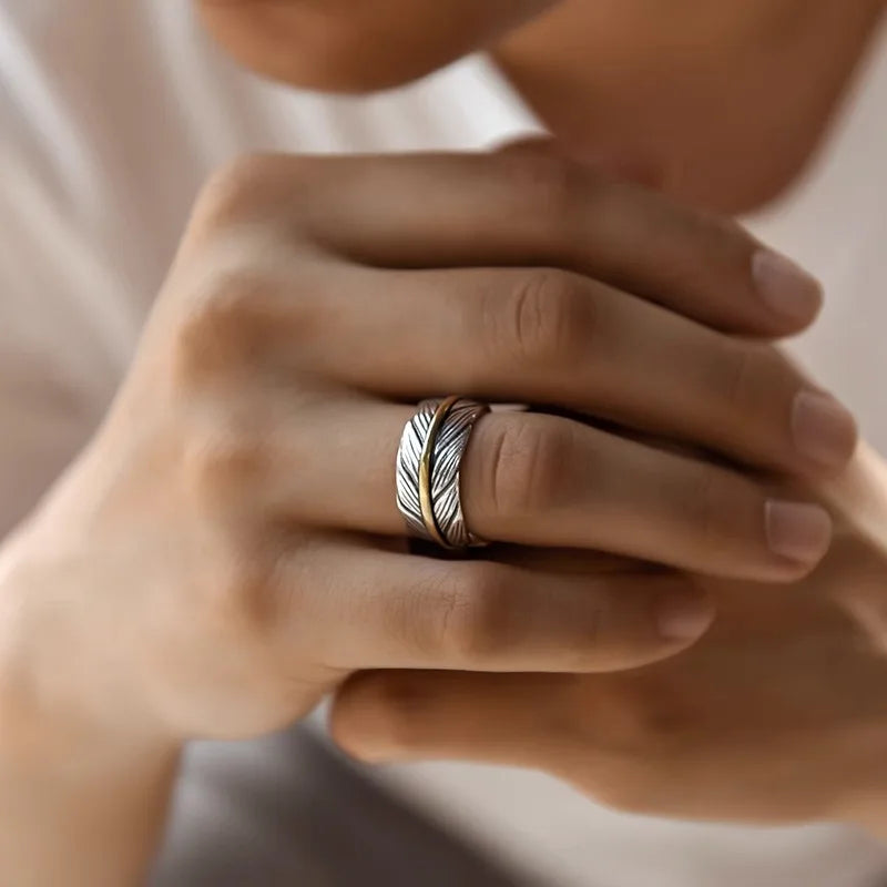 Open ring in a feather shape