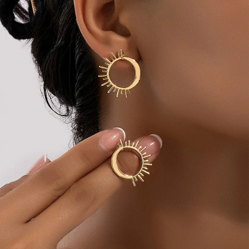 Moon and Sun Crescent Stud Earrings in gold