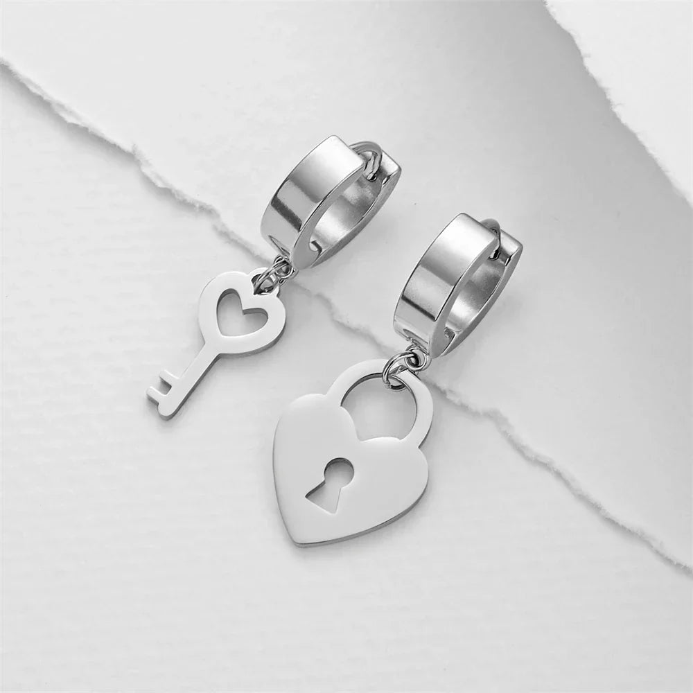 Silver key and padlock hoop earrings