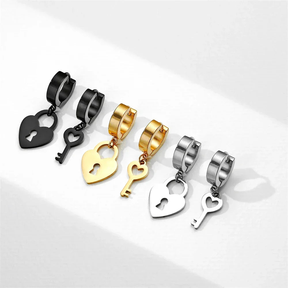 Gold key and padlock hoop earrings