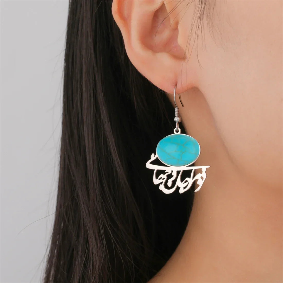 Oriental earrings with Arabic calligraphy and turquoise stone in silver