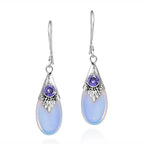 Серьги-подвески с цирконом и лунным камнем 1