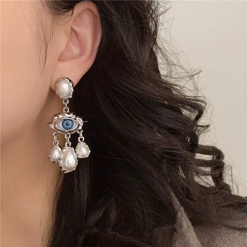Blue Eye and Pearl Drop Earrings in silver