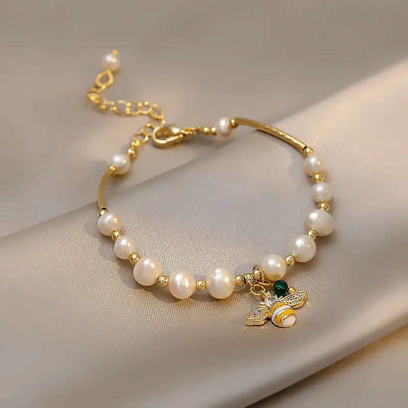 Bracelet with white bead bee