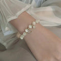 Beaded Bracelet with Four-Leaf Clovers