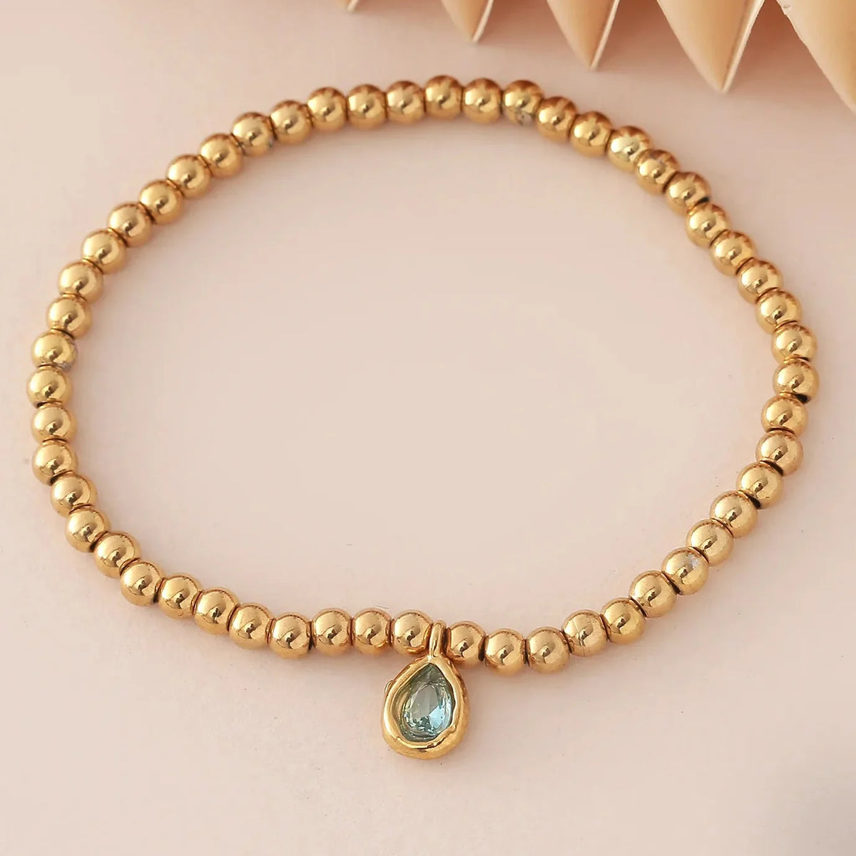 Gold-tone bracelet with birthstone for women