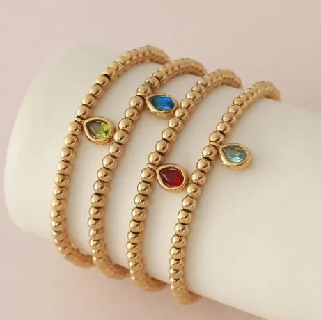 Gold-tone bracelet with birthstone for women
