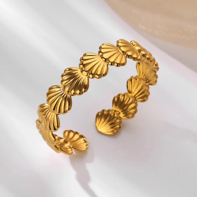 Elegant Seashell, Starfish, and Scallop Bracelet scallop gold