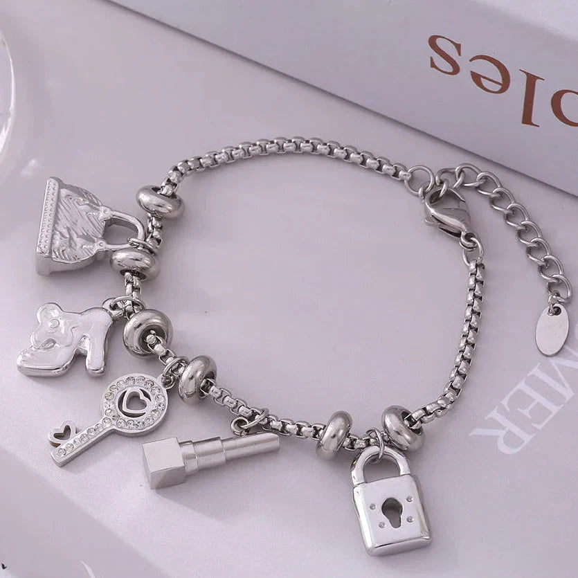 Women's bracelet with keys and locks in silver
