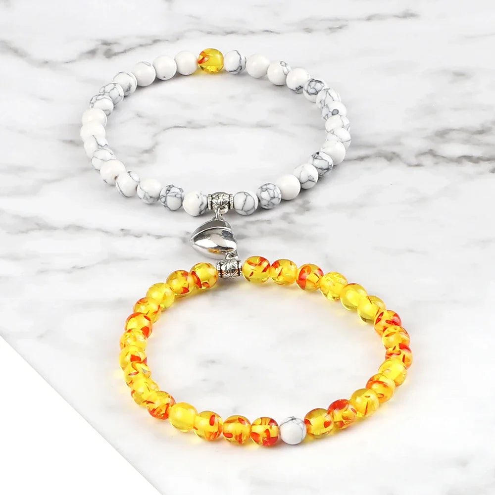 Couples' Magnetic Link Bracelets with white beads and sunstone beads