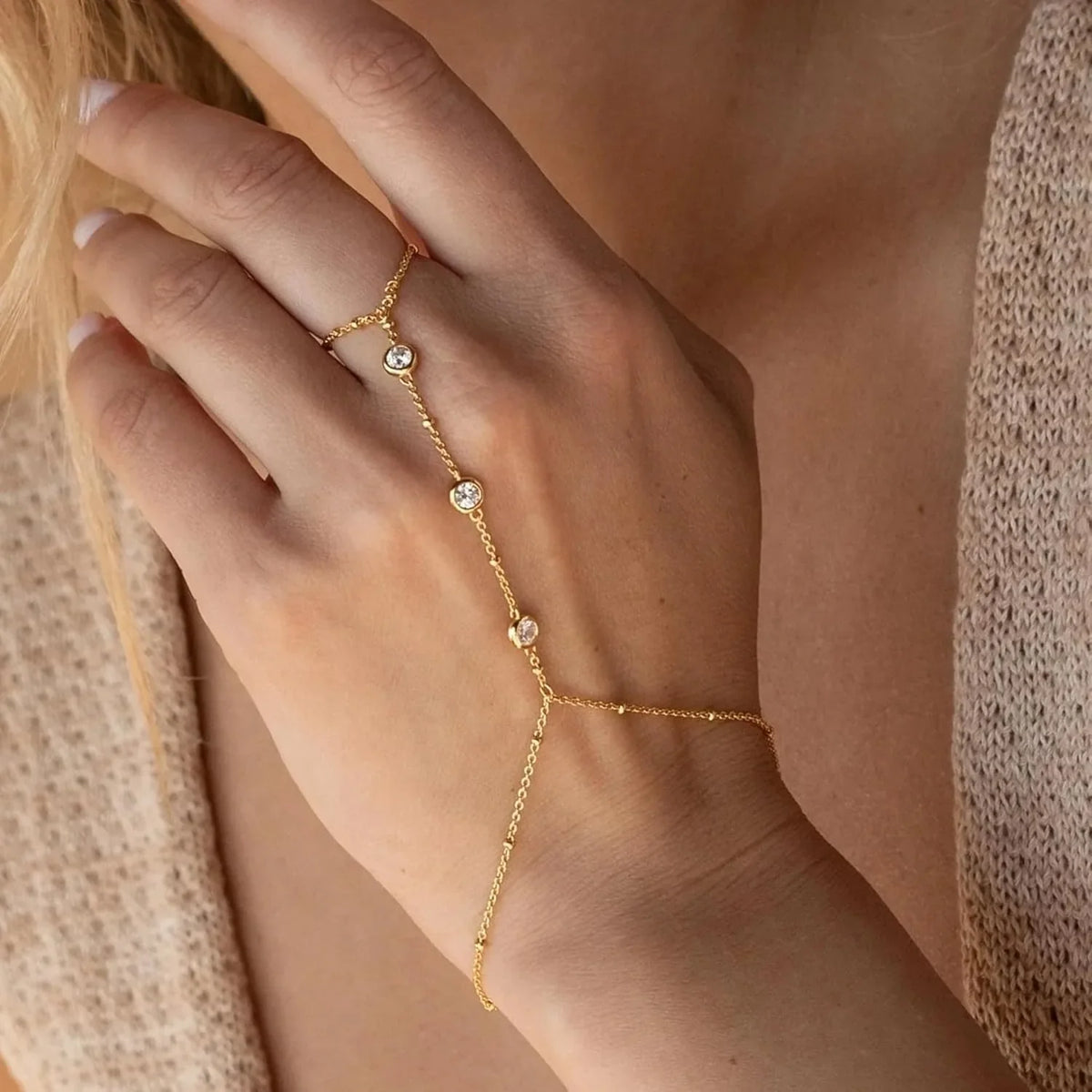 Hand and finger chain with cubic zirconia - women’s hand bracelet gold
