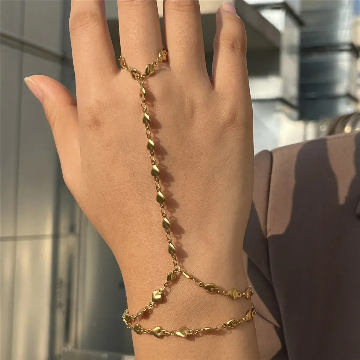 Heart hand and finger chain - women’s hand chain in gold