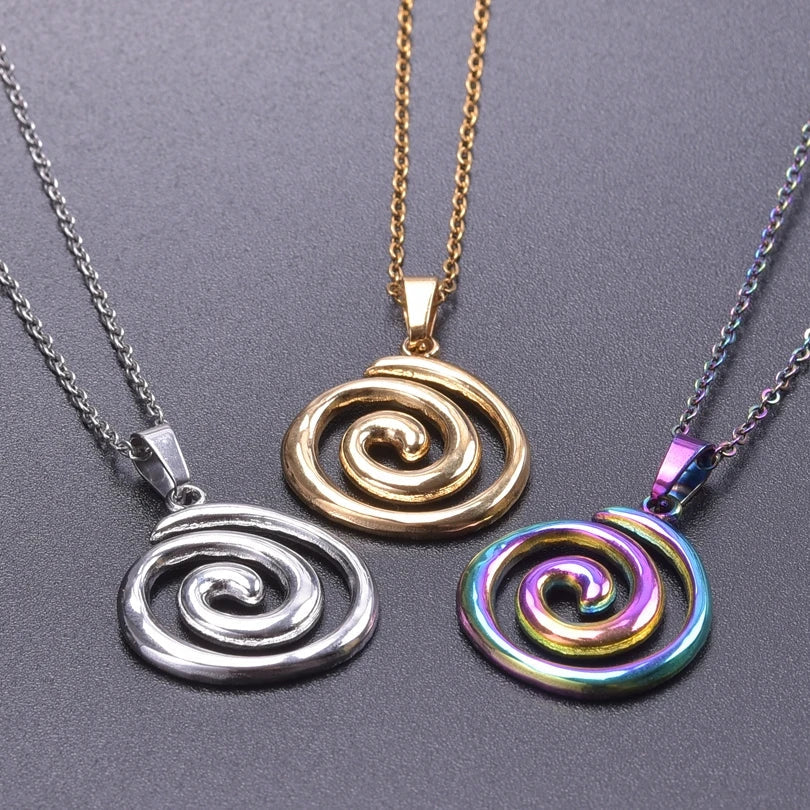 Necklace with large openwork spiral pendant in silver tone