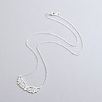 Necklace with large silver angel wings pendant