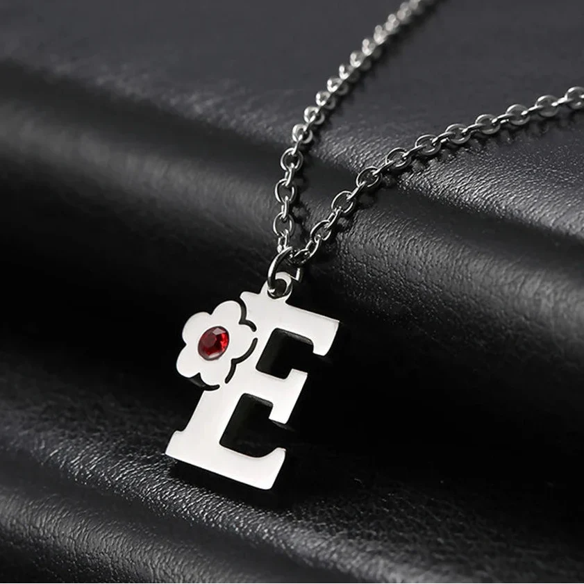 Necklace with initial and flower pendant e
