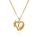 Collier avec pendentif initiale et coeur l