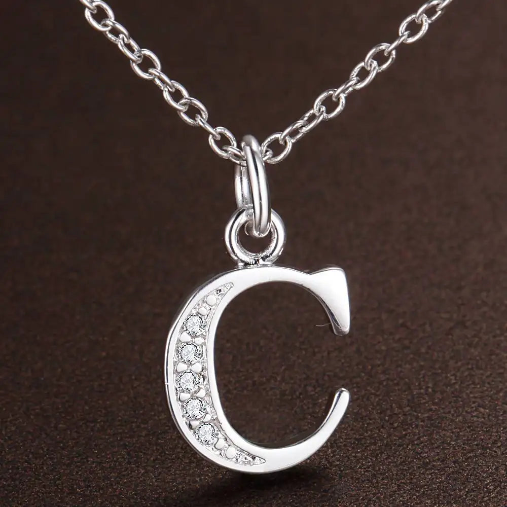 Long necklace with initial pendant c