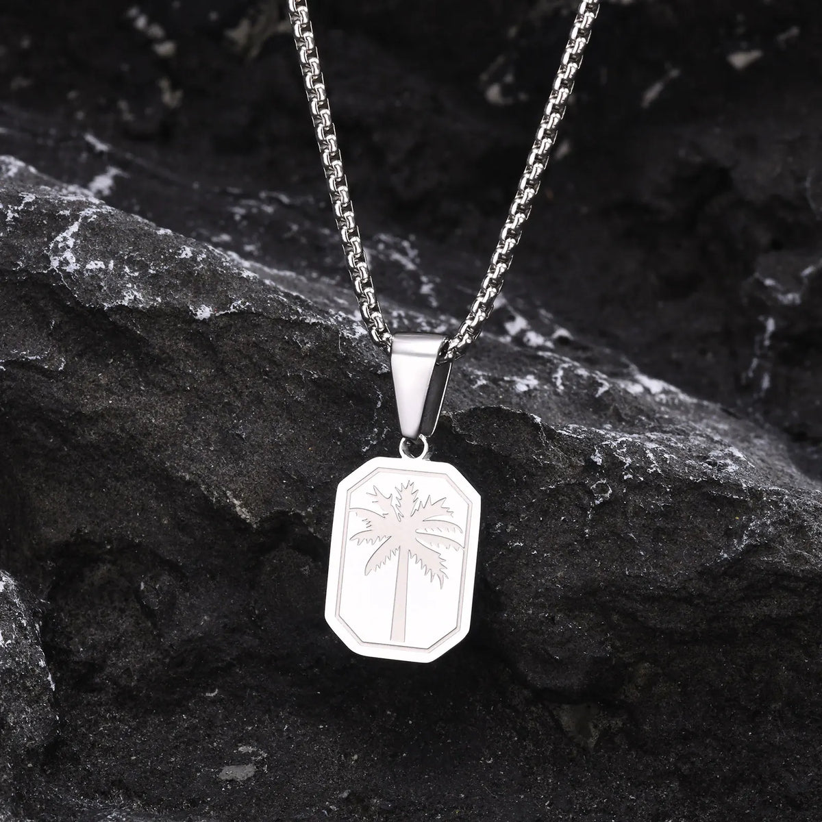 Geometric palm pendant necklace in silver
