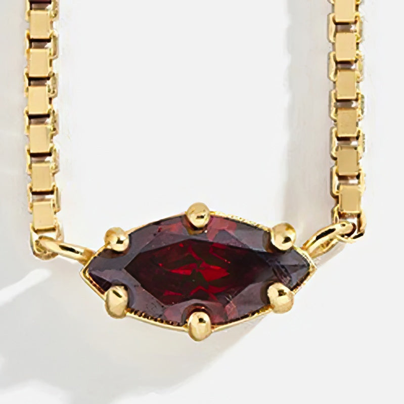 Necklace with eye-shaped birthstone pendant