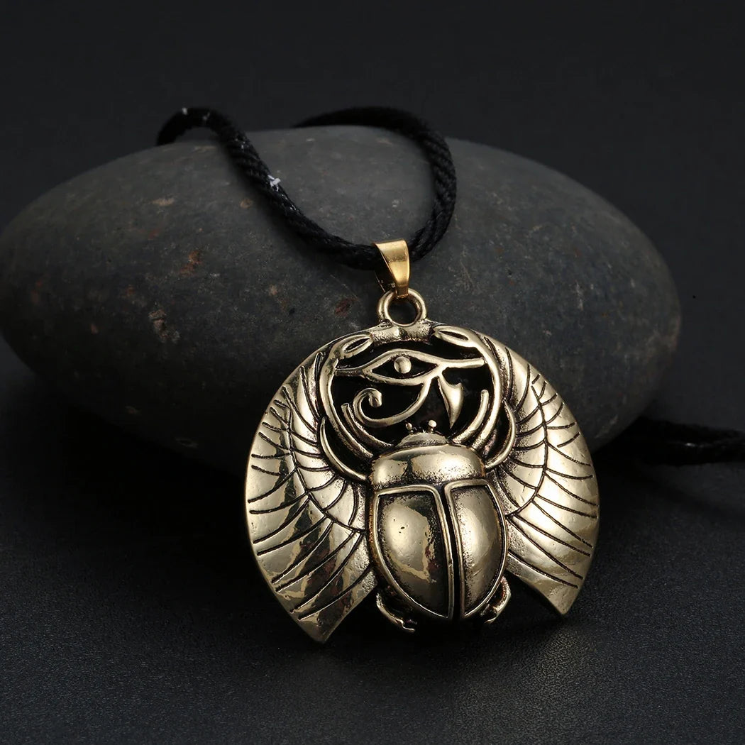 Necklace with Egyptian Scarab and Eye of Horus Pendant in rose gold