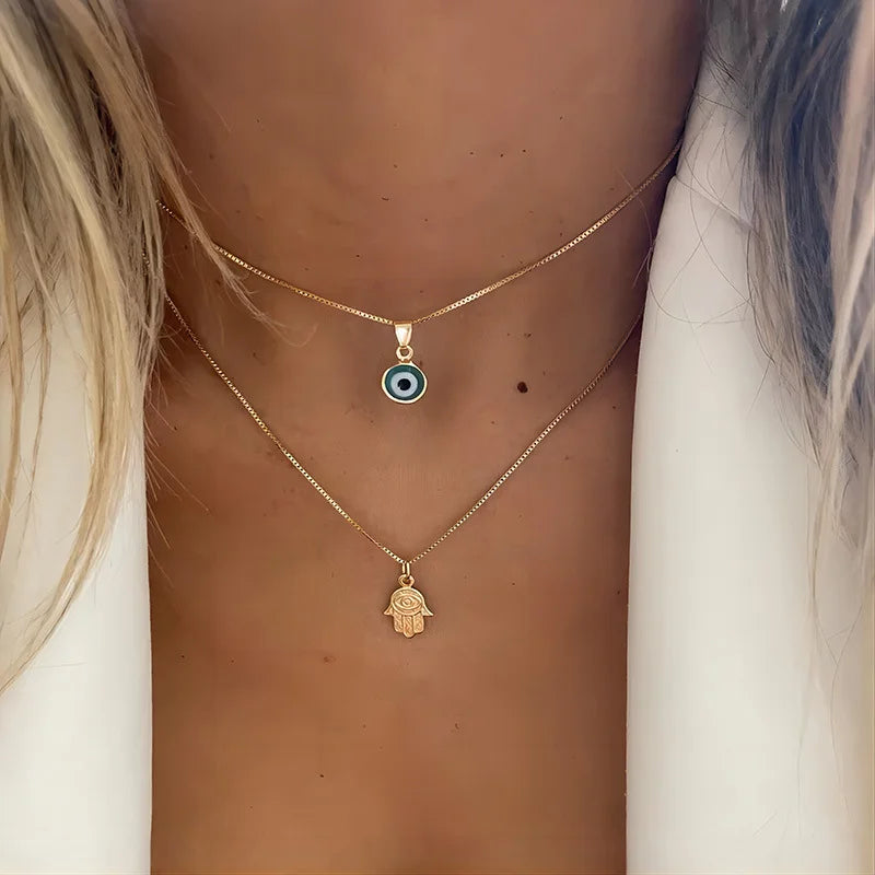Collier Double avec Pendentif Oeil Bleu Turc et Main de Fatma or