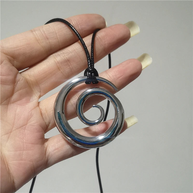 Long necklace with silver spiral pendant