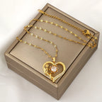 Pendant Necklace with Heart and Rotating Flower Stress-Relief
