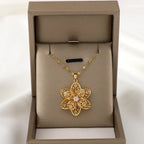 Collier Pendentif avec Jolie Fleur Tournante Anti-Stress