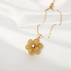 Collier Pendentif avec Jolie Fleur Tournante Anti-Stress