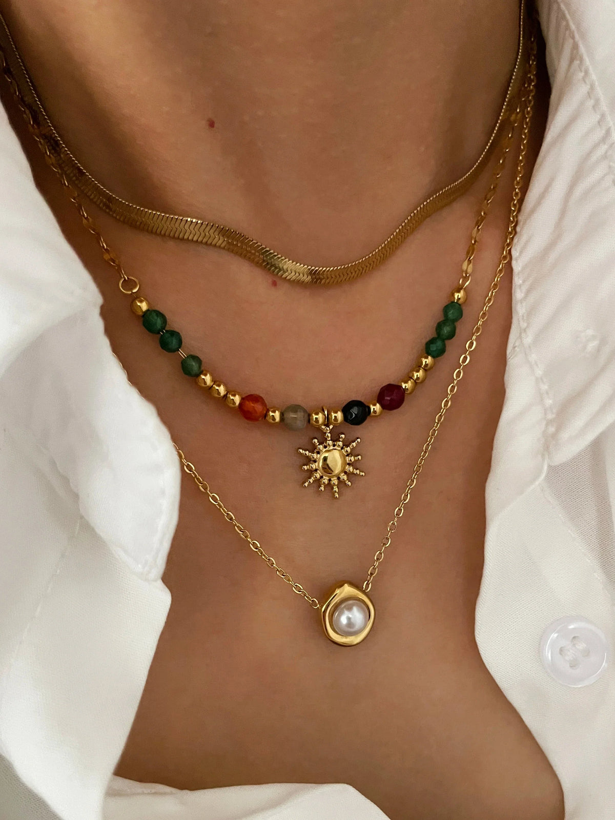 Sun Pendant and Beaded Necklaces a