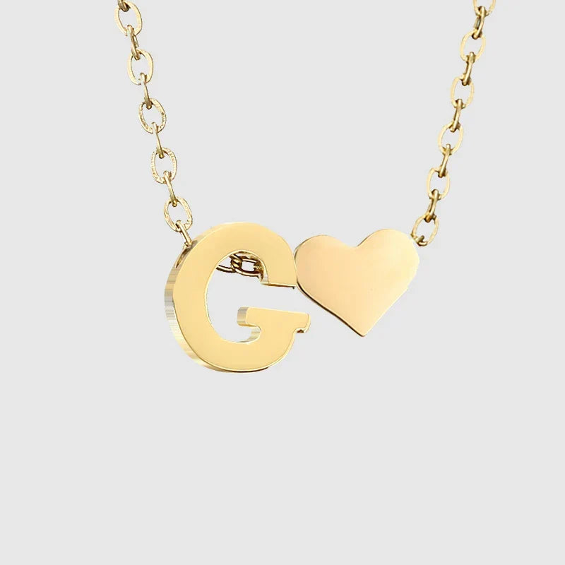 Women's necklace with heart pendant and initial - letter