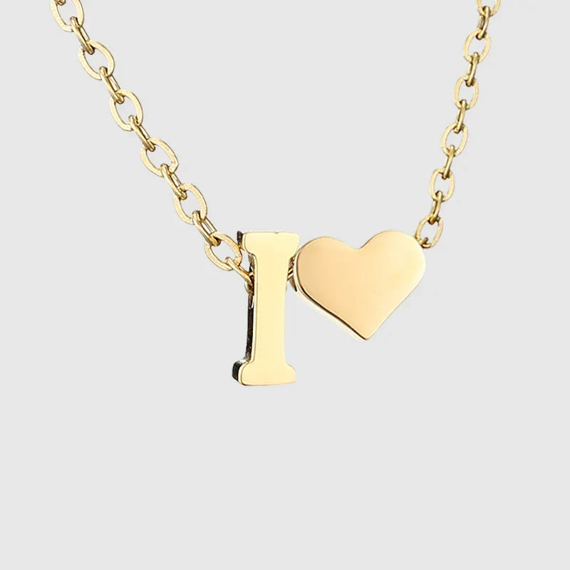 Women's necklace with heart pendant and initial - letter