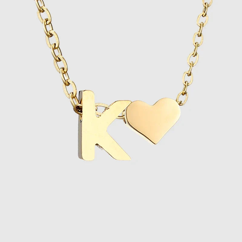 Women's necklace with heart pendant and initial - letter