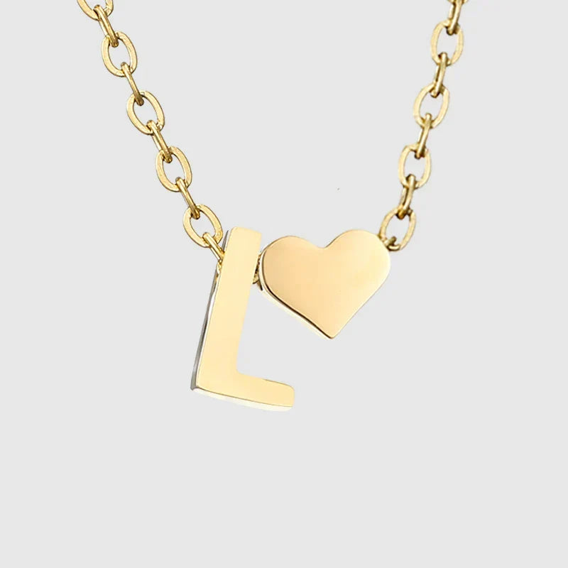 Women's necklace with heart pendant and initial - letter