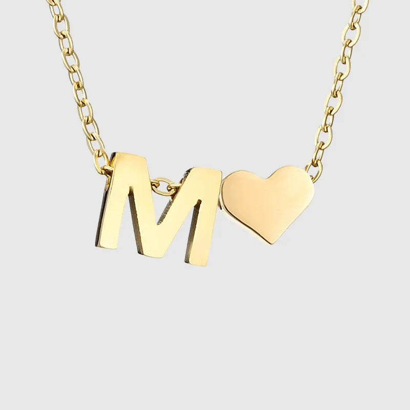 Women's necklace with heart pendant and initial - letter