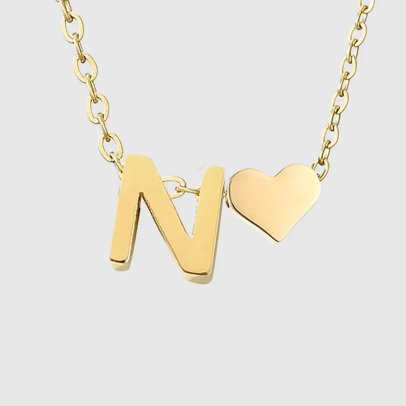 Women's necklace with heart pendant and initial - letter