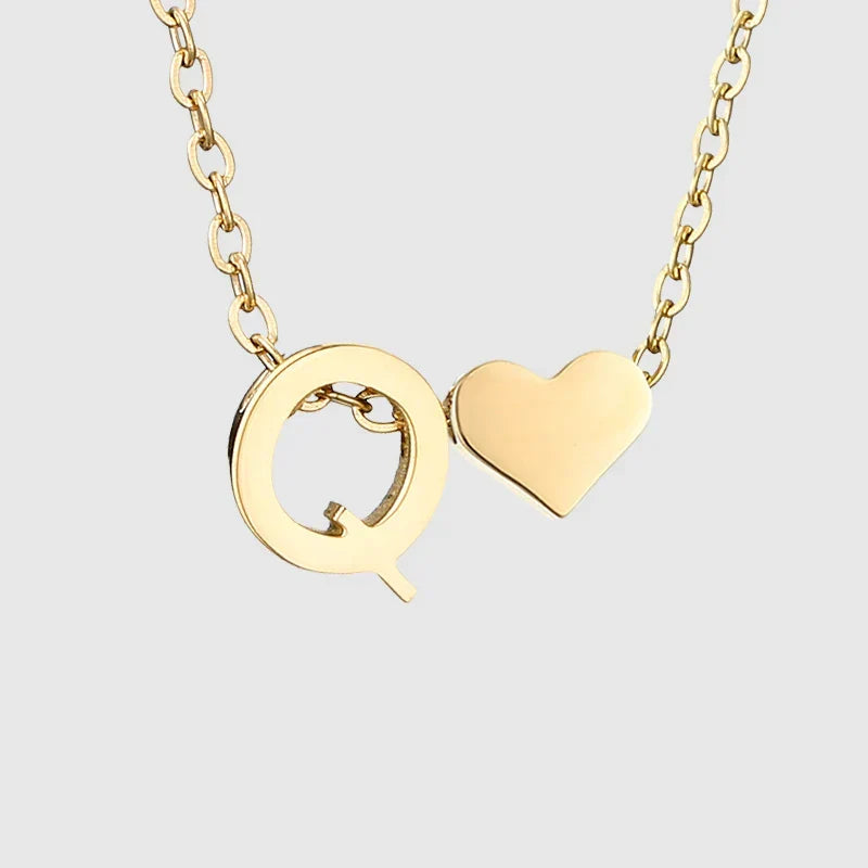 Women's necklace with heart pendant and initial - letter