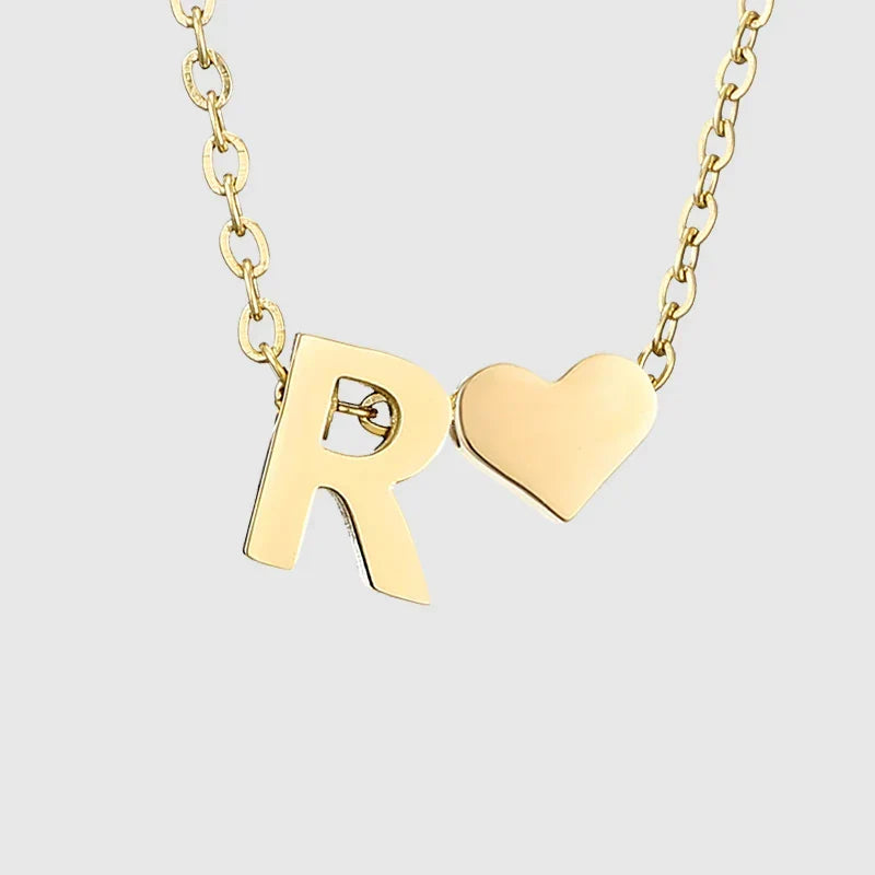 Women's necklace with heart pendant and initial - letter