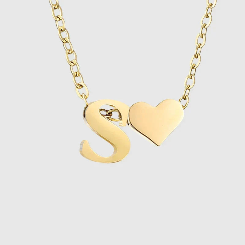 Women's necklace with heart pendant and initial - letter