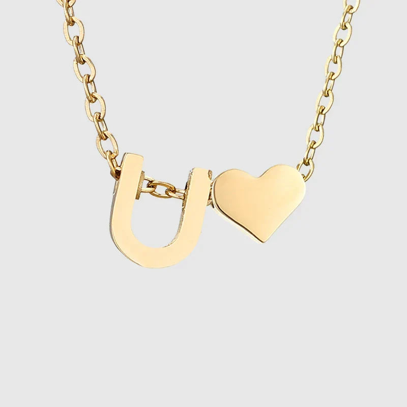 Women's necklace with heart pendant and initial - letter