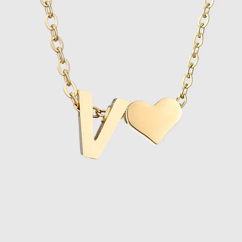 Women's necklace with heart pendant and initial - letter