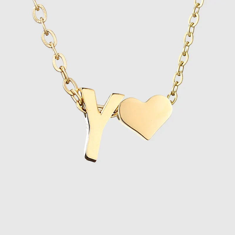 Women's necklace with heart pendant and initial - letter