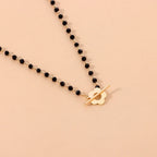 Floral Pendant Choker Necklace in Black and Gold