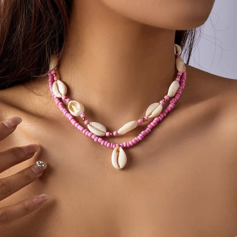 Double cowrie shell necklace, pink