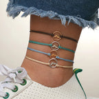Set of 4 Cord Bracelets with Round Mountain Pendant