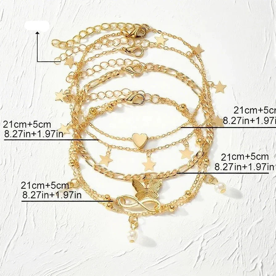 Set of 5 anklets: star, infinity, butterfly, beads, and heart